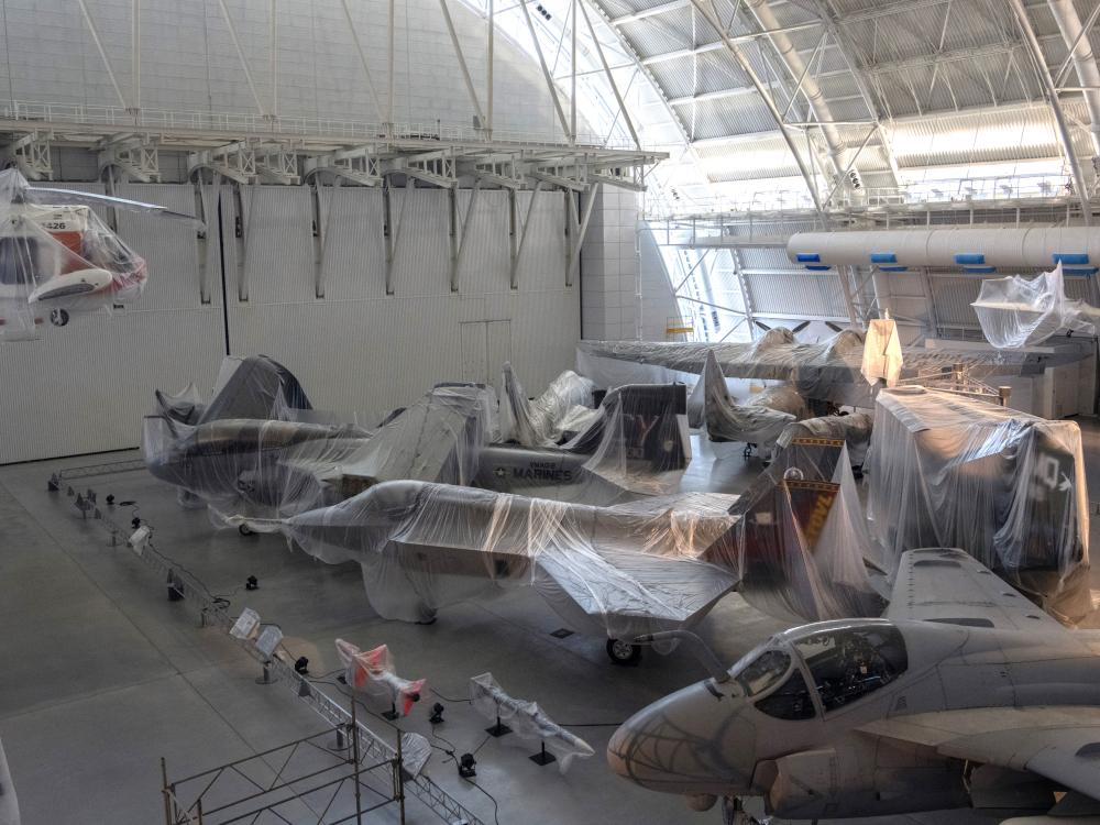 photo of aircraft covered in plastic