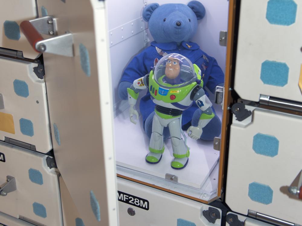 Buzz Lightyear and Magellan T. Bear in <i>Moving Beyond Earth</i>