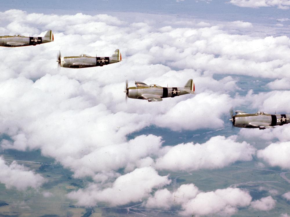 A flight of Mexican 201 Squadron P-47 Thunderbolts over Luzon