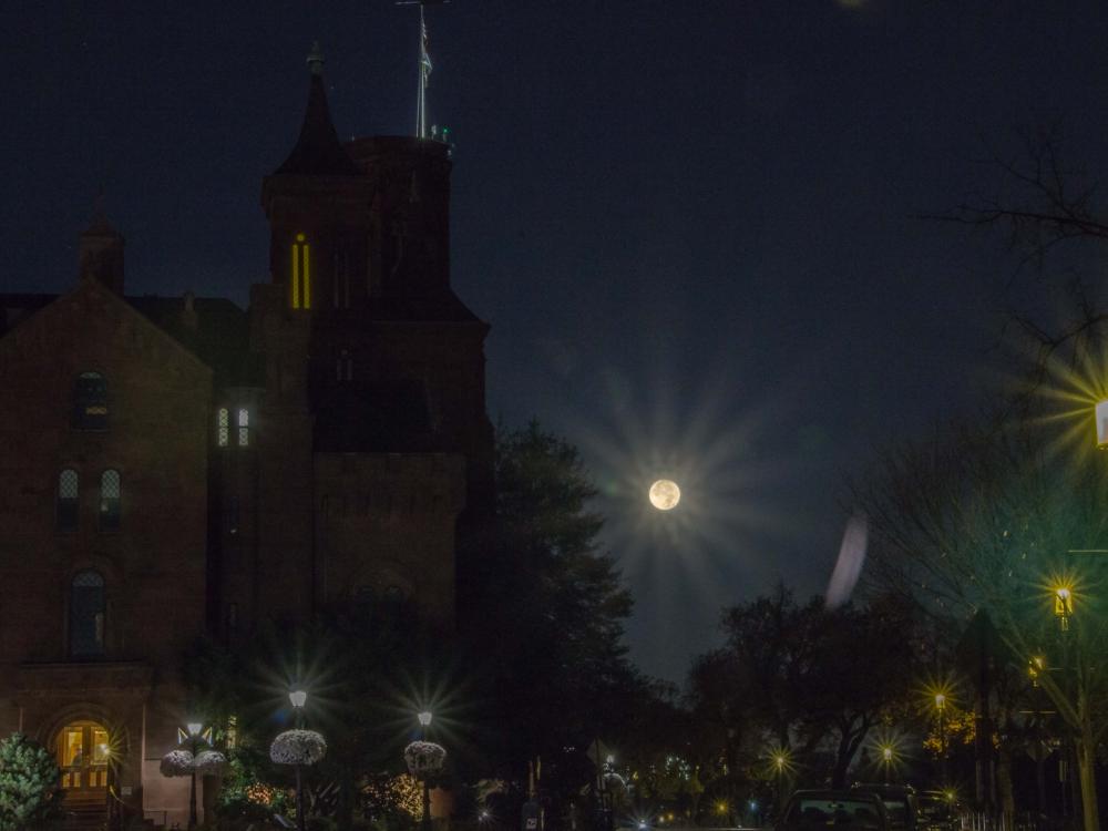 Image of Moon at night over the Smithsonian's Castle