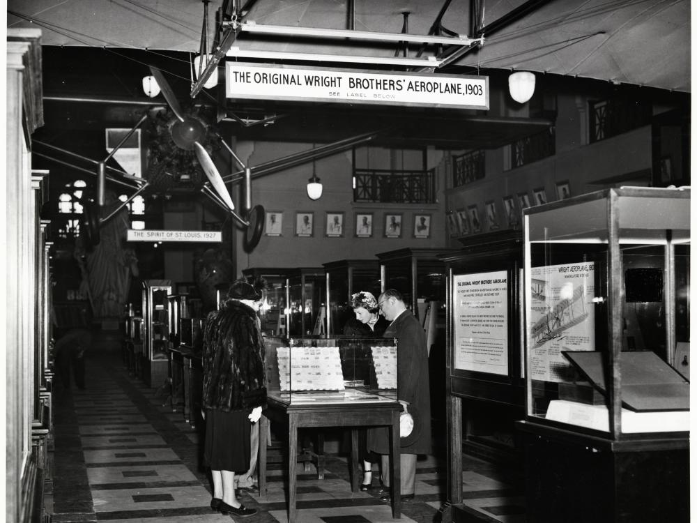 Visitors look at exhibit