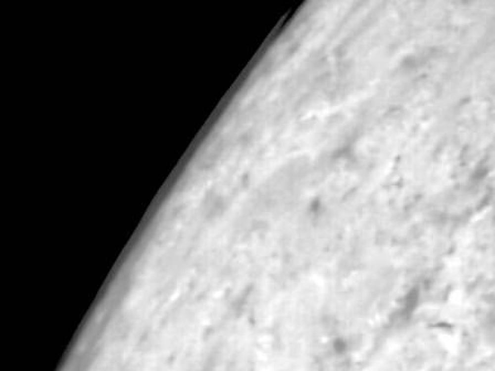 Clouds over Triton’s south pole.