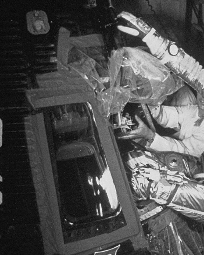 Astronaut John Glenn Climbing into the Mercury Spacecraft