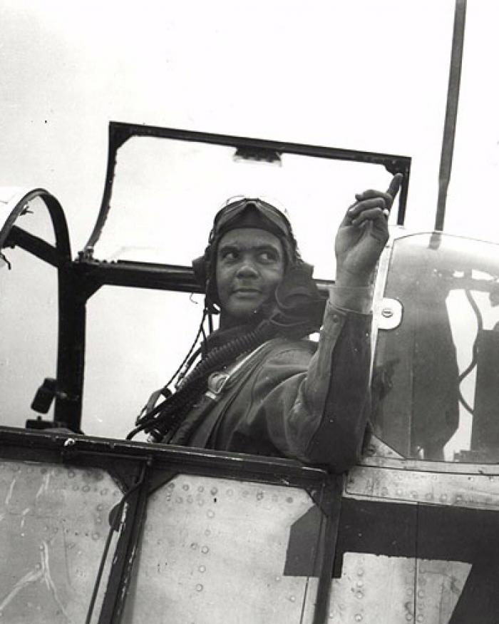 A black and white photograph of a pilot.