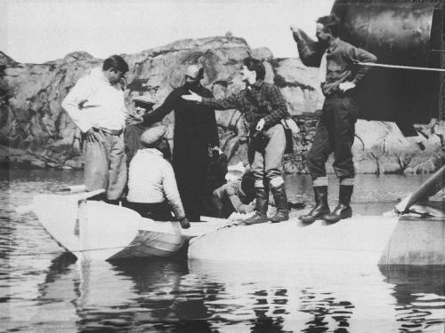 Arctic explorer Knud Rasmussen (left) meets Anne and Charles Lindbergh