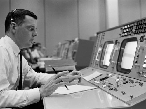 Man sitting at a flight control station