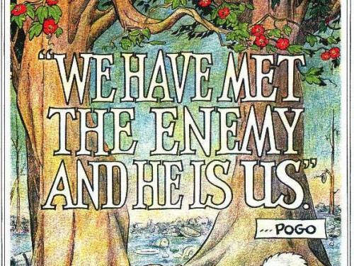 Drawing that says "WE HAVE MET THE ENEMY AND HE IS US"