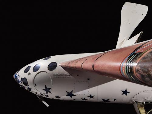 Profile view of SpaceShipOne against black background.