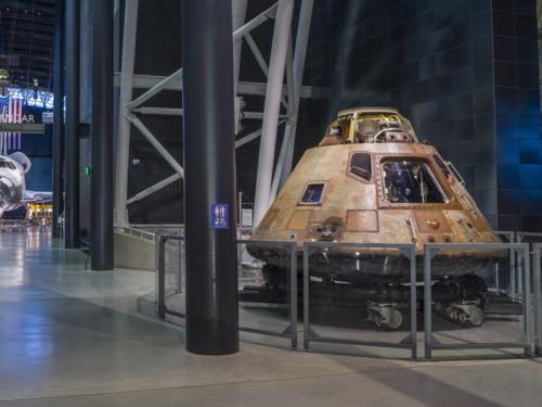 The Space Shuttle Discovery and Apollo 11 command module Columbia are both on display at the Steven F. Udvar-Hazy Center in this photograph.