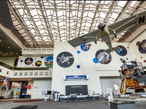 A lunar module and plane are visible in the gallery. 