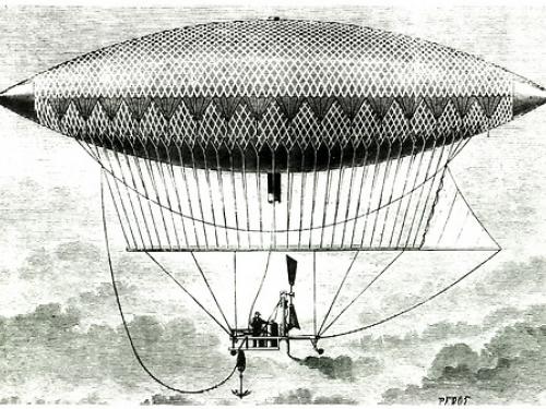 A black and white woodcut illustration of an airship in the sky.