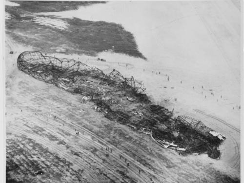 A aerial view of a crash site of a larger aircraft.