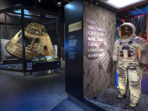 A view of the Destination Moon gallery. Neil Armstrong's spacesuit and the command module Columbia are both visable.