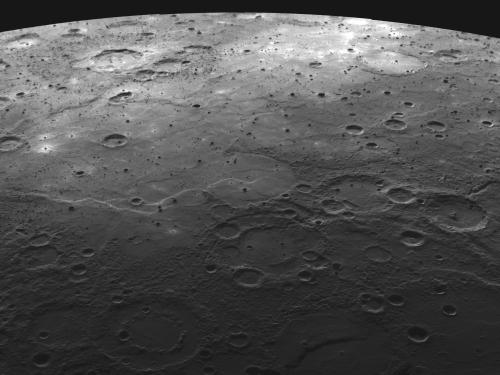 An image of the many lava flooded craters on Mercury's surface.