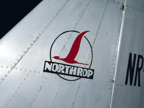 "Northrop" logo with red bird in circle on tail of metal Northrop Gamma Polar Star aircraft