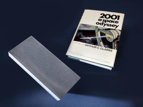 Signed Copy of 2001 A Space Odyssey and 'Monolith' Flown on Space Shuttle in 2001.
