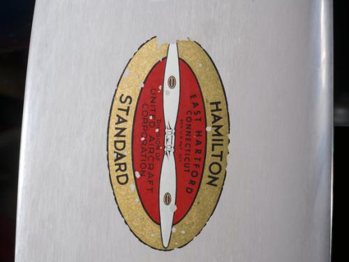 Close up image of the Hamilton Standard logo on a plane. 