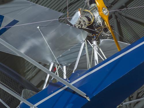 Close up view of an engine and propellers. 