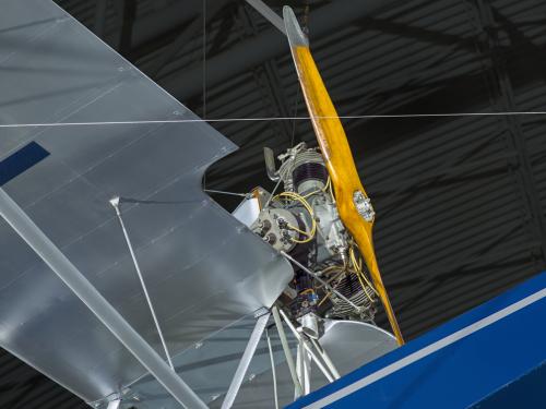 Close up view of an engine and propellers. 