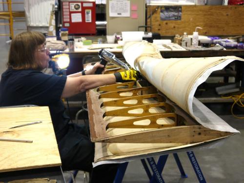 Conservator working on Flak-Bait