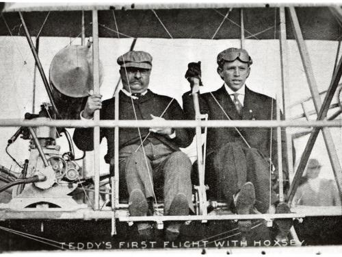 President Theodore Roosevelt (left) and pilot Arch Hoxsey (right) seated in Hoxsey's Wright (Co) Type AB.