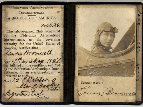 Old vintage aviator&#039;s license with a woman&#039;s face.