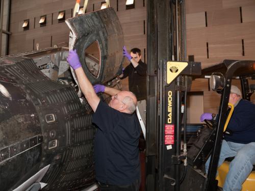 Gemini IV Hatch Attached to Crane