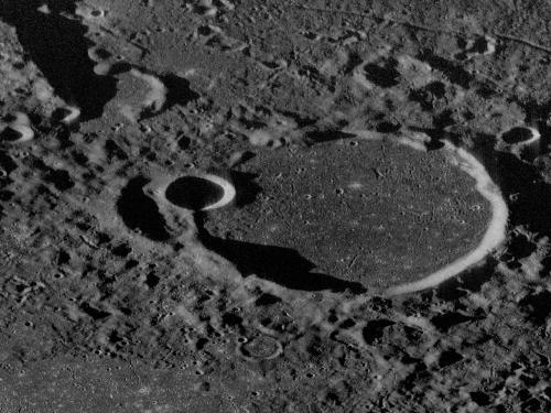 Close-up radar view of a large crater on the Moon which created a mountain-like surface in the area.