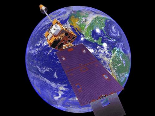 Animation of a satellite orbiting the Earth. The satellite has a box-shaped base and a large solar panel on one side.