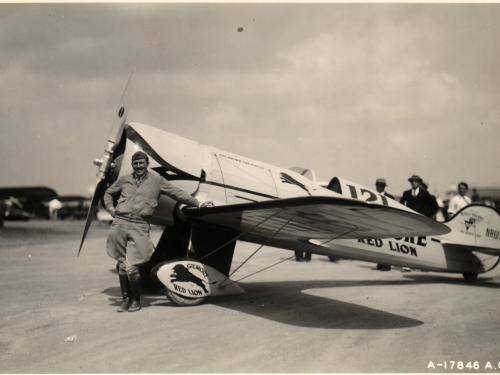 Col. Roscoe Turner Posing with Racer