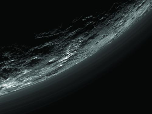 Close-up view of translucent haze in terrestial dwarf planet Pluto's atmosphere.