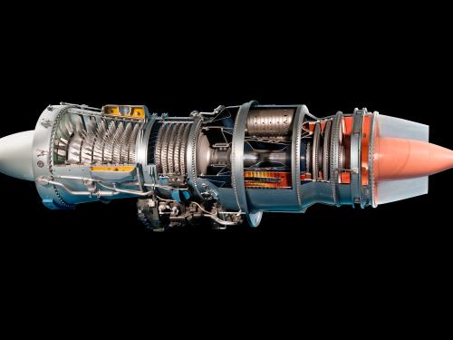 Engine scale model with two cylinders attached together and long tipped parts at each end.