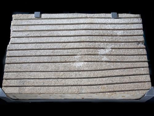 Section of concrete with grooved lines used in testing whether they would remove water on aircraft runaways.