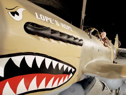 Don Lopez in cockpit of Curtiss P-40