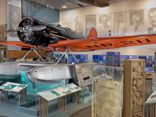 Low-wing monoplane with pontoon floats shown on exhibit