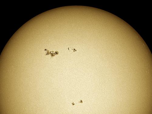 Partial disk view of the Sun highlighting a sunspot which has transformed into a solar flare.