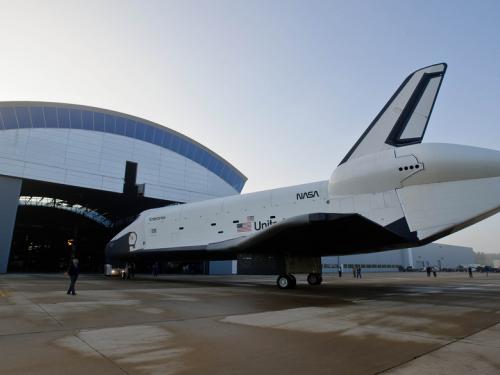 The Space Shuttle Enterprise is taken out of the Steven F. Udvar-Hazy Center prior to the placement of the Space Shuttle Discovery.