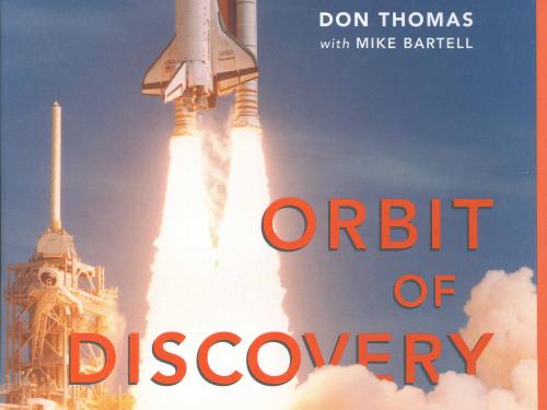 Book cover for a book about a space mission with all astronauts from Ohio featuring a photo of a space shuttle launching from Earth.