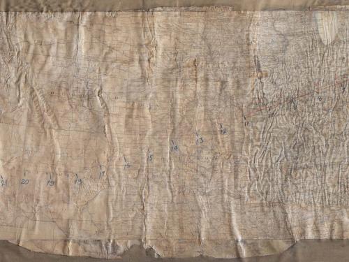 Close-up view of faded map of the United States used to mark stops on the first successful transcontinental flight.