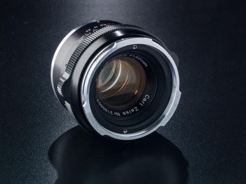 Single black camera lens.