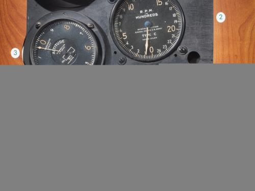 Three measuring instruments on a panel used during the historic T-2 flight. Panel has been removed from the aircraft.