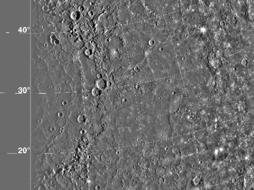 A satellite view of the Caloris Basin on Mercury. The basin features many craters of various sizes.