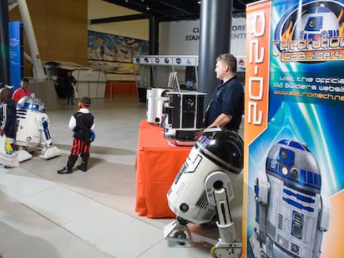 Kids Enjoy an Encounter with R2D2 at Air & Scare