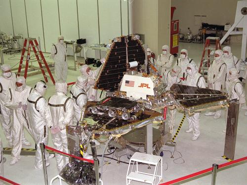 Workers in the Jet Propulsion Laboratory work to prepare the Mars Pathfinder Lander before its flight to Mars.