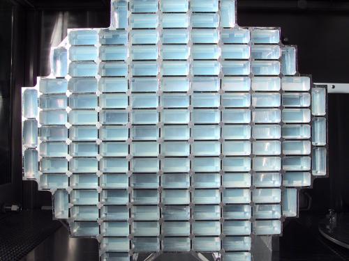 A honeycomb-like structure of rectangular aluminum cells filled with aerogel.