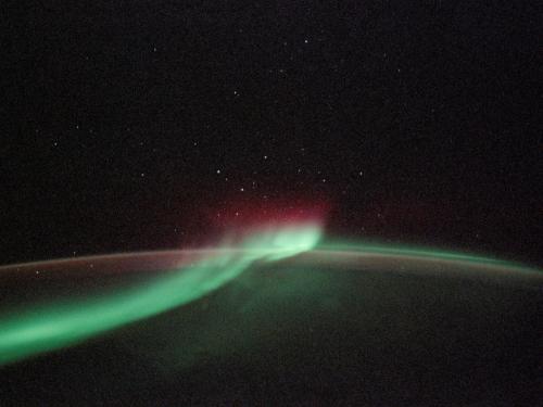 A view of the Aurora Australis, a phenomeon known as "southern lights", from the Space Shuttle Discovery above Earth.