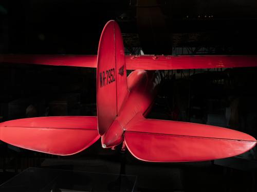 Tail of red Amelia Earhart Lockheed Vega 5B aircraft