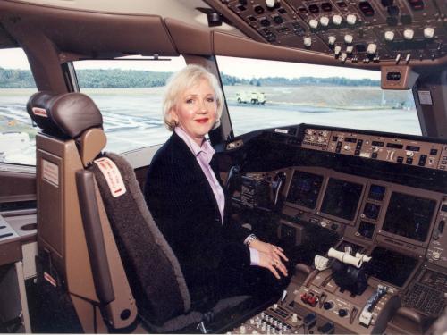 Suzanna Darcy-Hennemann in the cockpit of a plane. 