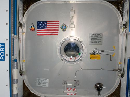 flag on wall on space station