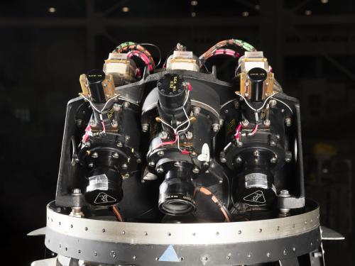 Three camera lenses on top portion of black Ranger spacecraft